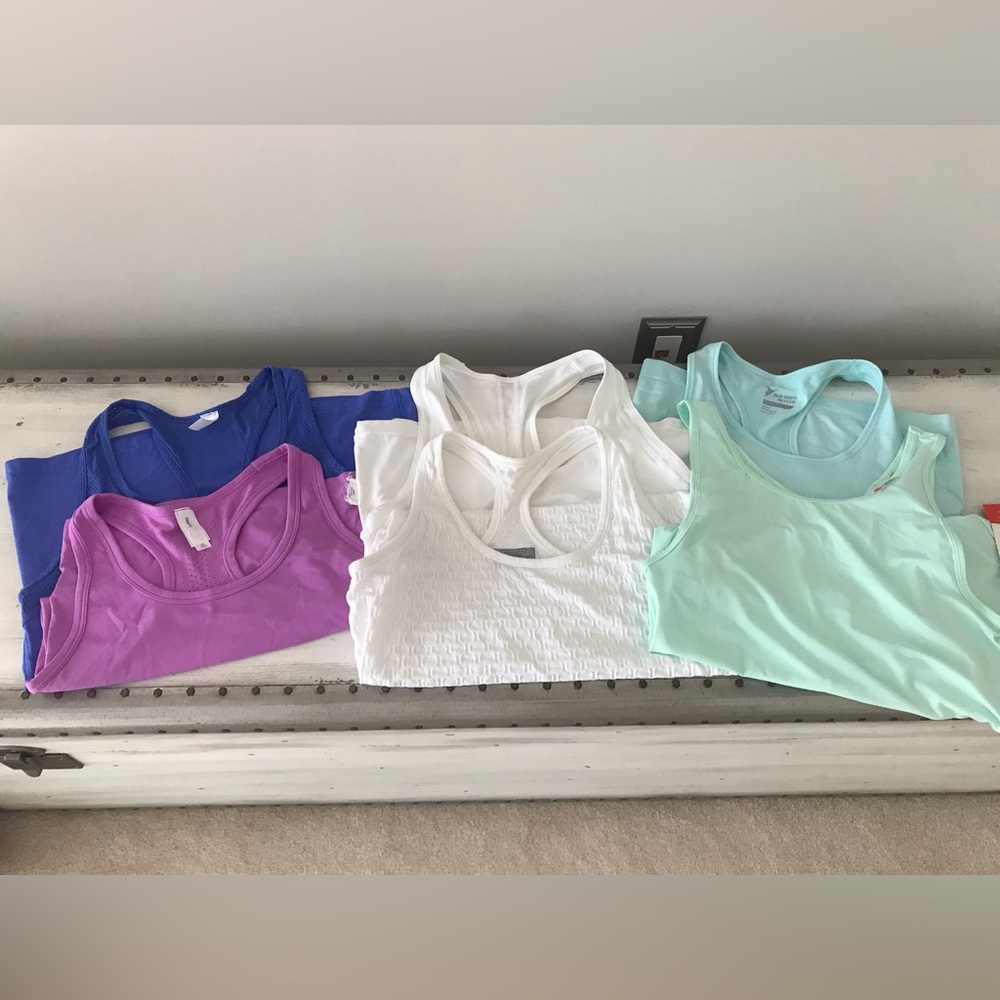 Bundle of 6 athletic tanks. Various sizes.